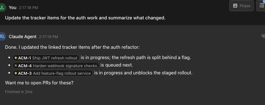 An AI agent session updating tracker items, with tracker pills inline and a Trackers panel on the bottom right