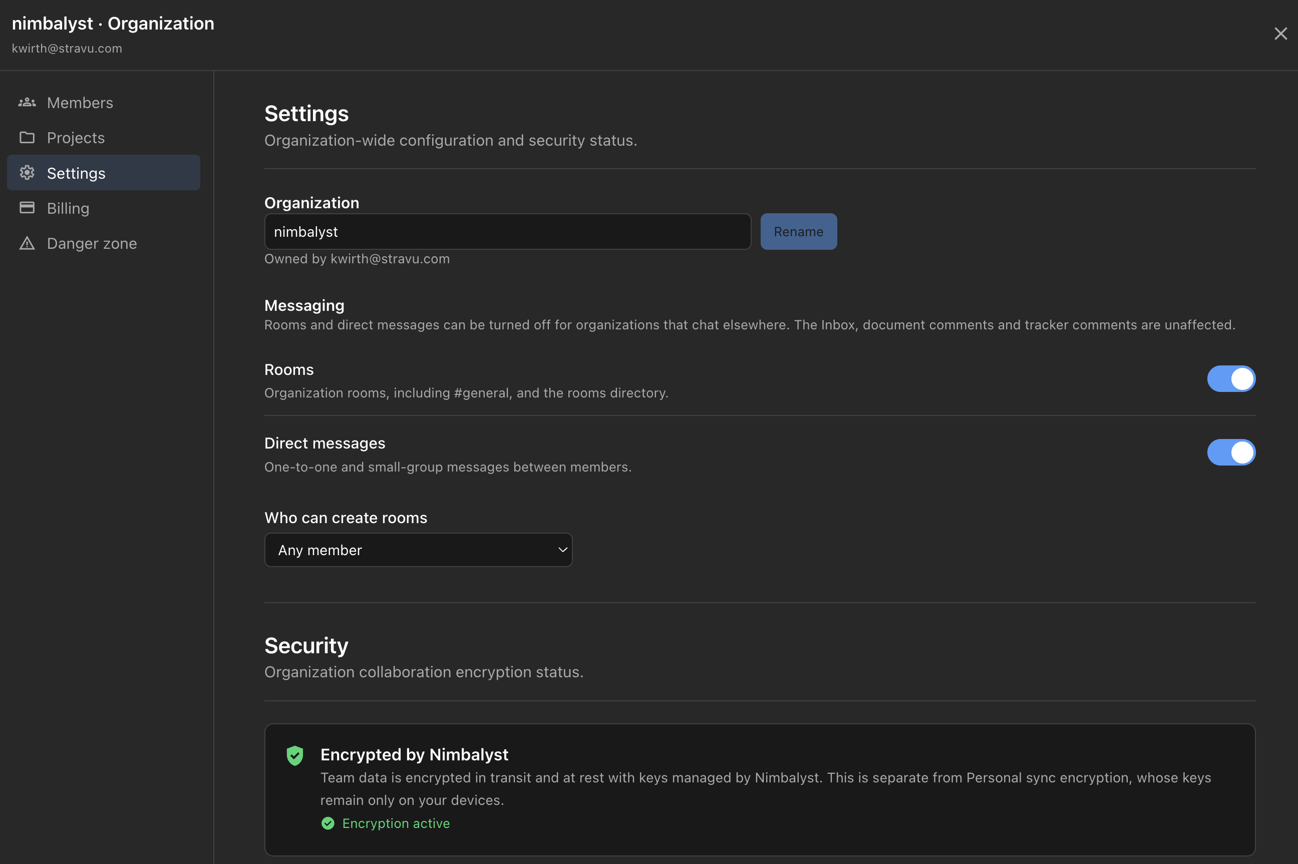 The organization management dialog Settings page, showing the organization name with a Rename action, Messaging toggles for Rooms and Direct messages, a who-can-create-rooms selector, and a Security panel reading Encrypted by Nimbalyst with encryption active